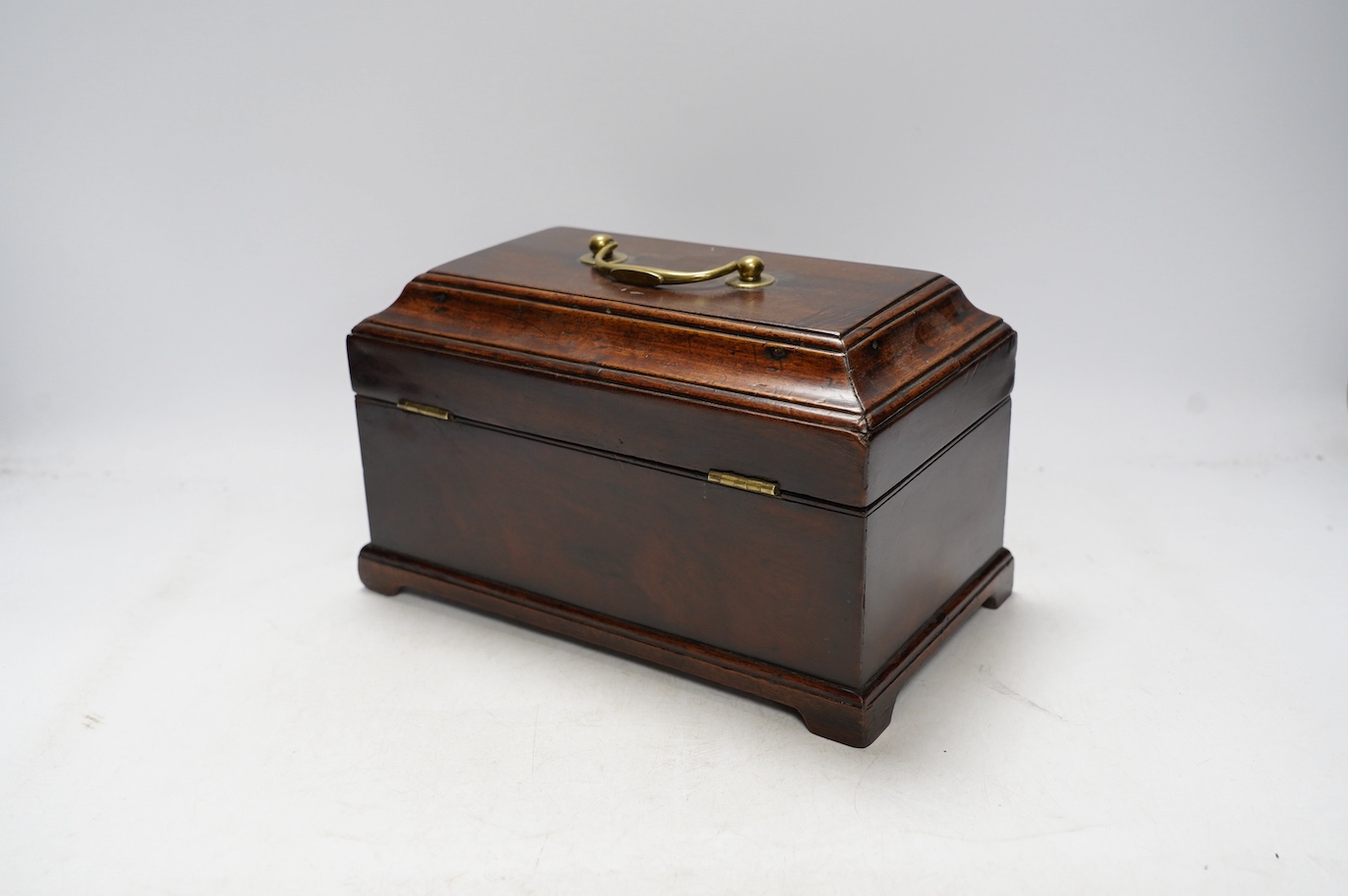 A George III mahogany tea caddy, 25cm wide. Condition - fair